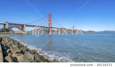 Golden gate bridge view from the shore of the bay in San Francisco, California 89138531