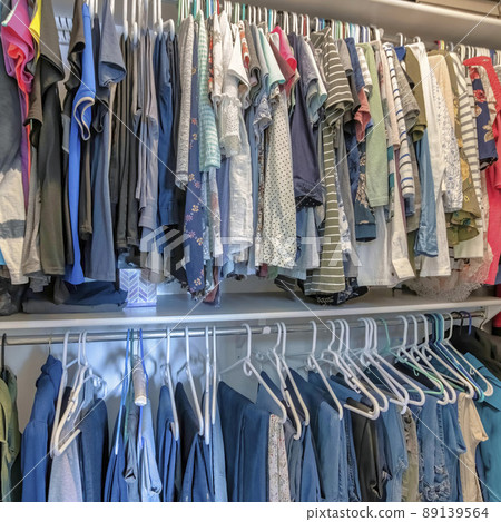 Square Walk in closet interior of a house with open shelving unit Square Walk in closet interior of a house with open shelving unit 89139564