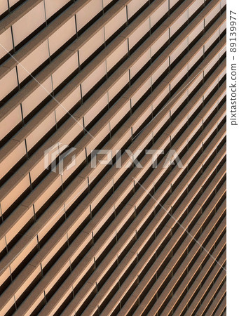 Vertical Building exterior with bronze reflective glass screen at Salt Lake City in Utah Vertical Building exterior with bronze reflective glass screen at Salt Lake City in Utah 89139977