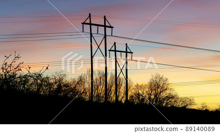 Panorama Silhoutte of transmission towers against the sunset night sky at Provo in Utah Panorama Silhoutte of transmission towers against the sunset night sky at Provo in Utah 89140089
