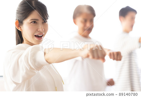 A woman attending a karate class A woman attending a karate class 89140780