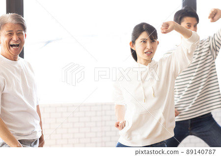 A woman attending a karate class 89140787