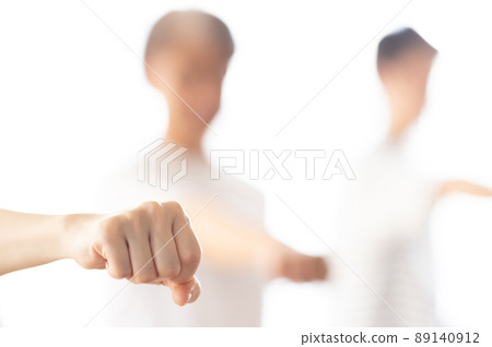 A woman attending a karate class 89140912