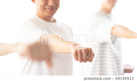 A man attending a karate class 89140913