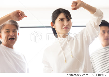 A woman attending a karate class 89140917