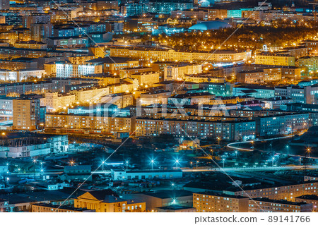 Beautiful night city landscape. Aerial view of city blocks. 89141766