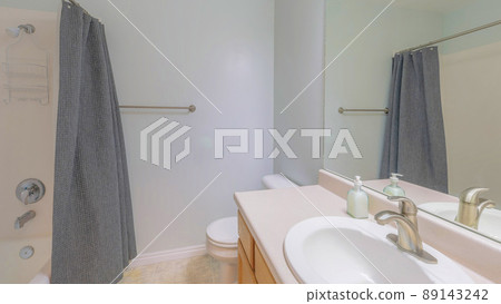 Panorama Bathroom with blush blue interior and ceramic tiles floor 89143242