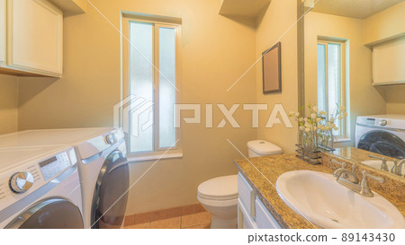Panorama Small laundry and bathroom interior with narrow window 89143430