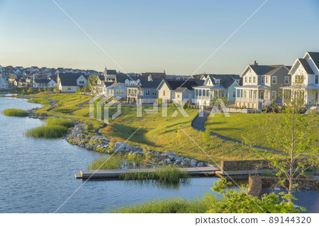 Residential houses at Daybreak in South Jordan, Utah with Oquirrh Lake waterfront Residential houses at Daybreak in South Jordan, Utah with Oquirrh Lake waterfront 89144320