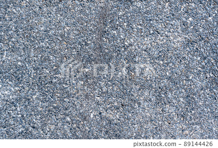 The surface of the old roof is covered with rubiroid close-up. construction concept. Texture The surface of the old roof is covered with rubiroid close-up. construction concept. Texture 89144426