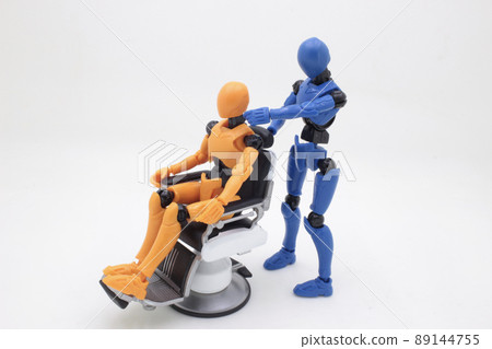 a figure having haircut at barber shop 89144755