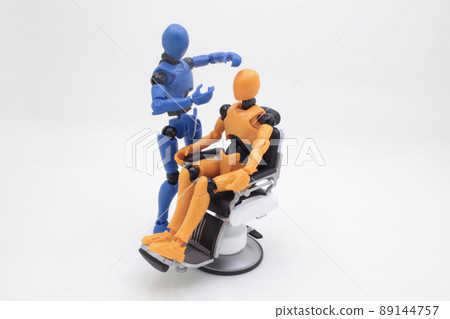 a figure having haircut at barber shop 89144757
