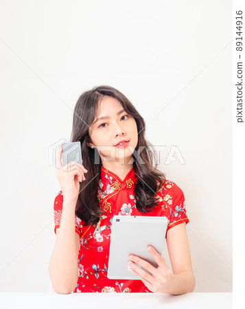 Written by Tradition, Cheongsam, Smile, Female, White Background, Previously Used Credit Cards and Tablets. 89144916