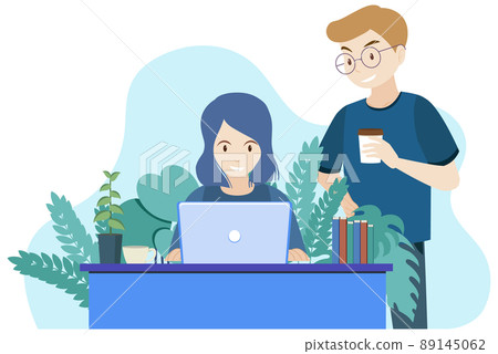 Man and woman working on computer 89145062