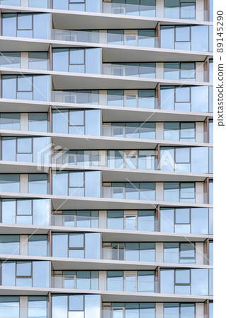 Glass building with glass railing on the balconies at Silicon Valley, San Jose bay area, California 89145290
