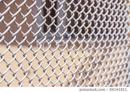 Chain link fence outside the building in San Francisco, California 89145951
