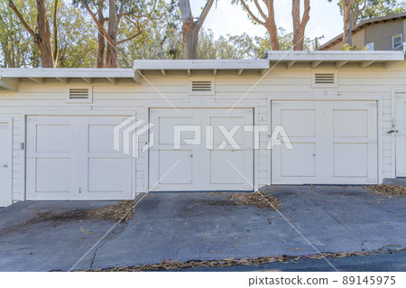 Garage doors on a sloped area in San Francisco, California Garage doors on a sloped area in San Francisco, California 89145975
