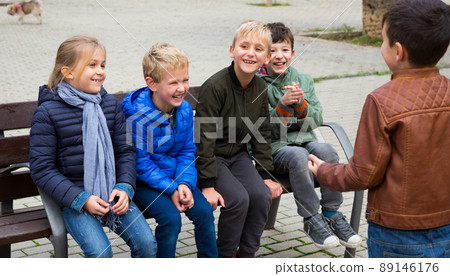 Children playing with small ball outdoor 89146176