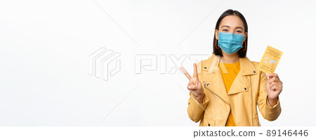 Hey you got point. Cheerful cute asian lively girl dark short haircut pointing camera finger-pistol smiling broadly, encourage friend make move, congratulate coworker good job, stand blue background Hey you got point. Cheerful cute asian lively girl dark short haircut pointing camera finger-pistol smiling broadly, encourage friend make move, congratulate coworker good job, stand blue background 89146446