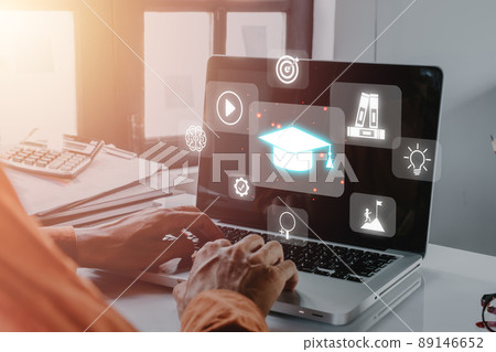 Online education training, Person hand using laptop computer with VR screen education icon background, webinar online. 89146652