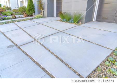 Driveways with concrete pavers and plants on the side at San Francisco, California 89146873