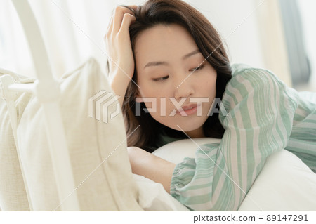 Young woman lying upset Young woman lying upset 89147291