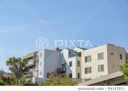 Apartment complex building with vinyl lap siding and emergency stairs in San Francisco, California Apartment complex building with vinyl lap siding and emergency stairs in San Francisco, California 89147851