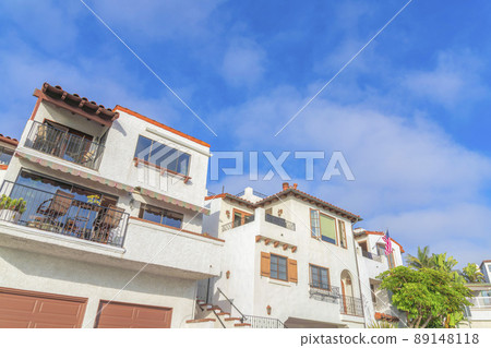 Low angle view of the neighborhood in San Clemente, California with mediterranean designs 89148118