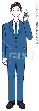 A cute man in a suit who is happy to come up with a good idea and point his finger at it. 89149965