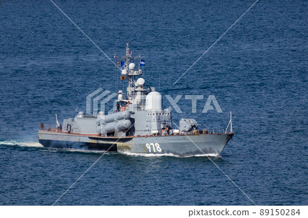 Warship in the blue sea. A Russian torpedo bomber is moving across the sea at high speed. 89150284