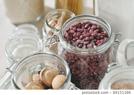 Grocery stock, food and cereals. Zero Waste Kitchen. Plastic Free Pantry. No plastic. Eco family life, close up view. Grocery stock, food and cereals. Zero Waste Kitchen. Plastic Free Pantry. No plastic. Eco family life, close up view. 89151166