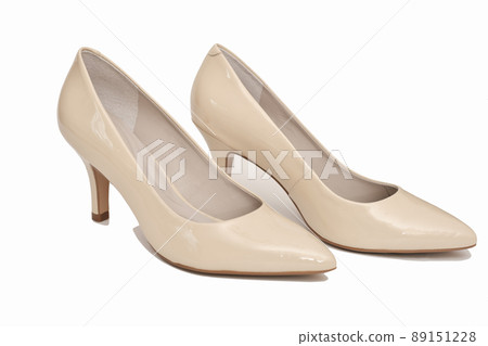 elegant leather beige shoes isolated on white background. fashion, retail or blogger content. high heel everyday comfortable shoes 89151228