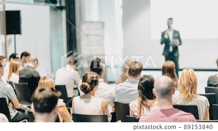 Business speaker giving a talk at business conference event. 89153840