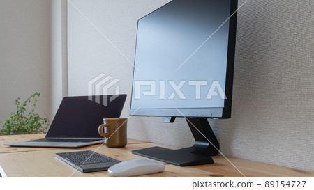 Laptop and monitor on the desk Laptop and monitor on the desk 89154727