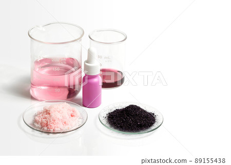 Potassium Permanganate Liquid, Serum bottle with dropper, KMnO4 and Pink flake chemicals in Chemical Watch Glass. Cosmetic chemicals ingredient on white laboratory table. Potassium Permanganate Liquid, Serum bottle with dropper, KMnO4 and Pink flake chemicals in Chemical Watch Glass. Cosmetic chemicals ingredient on white laboratory table. 89155438