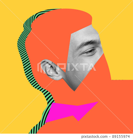 Contemporary colorful and conceptual bright art collage. Smiling young man with drawings covering face isolated over yellow background 89155974