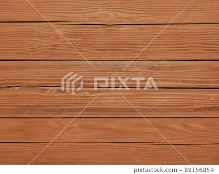 Tasteful mahogany-colored wood cracked due to deterioration over time Tasteful mahogany-colored wood cracked due to deterioration over time 89156859