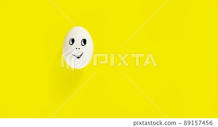 white egg with cheerful face on yellow background white egg with cheerful face on yellow background 89157456