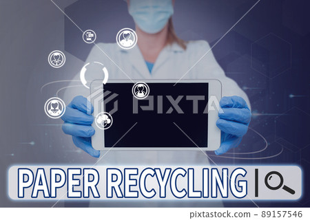 Sign displaying Paper Recycling. Business approach Using the waste papers in a new way by recycling them Nurse holding tablet symbolizing successful teamwork accomplishments. 89157546