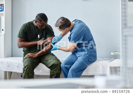 Doctor Palpating Patients Arm Doctor Palpating Patients Arm 89159726