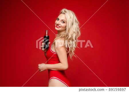 Portrait of young smiling blond model in summer 89159897