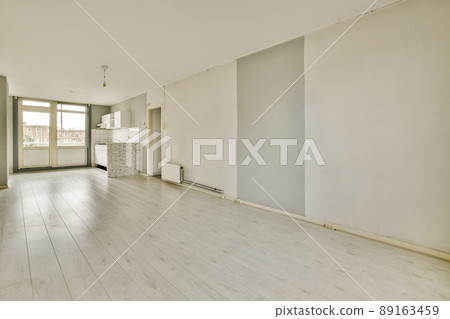 Corner kitchen of a light shade in a minimalist style in a studio apartment Corner kitchen of a light shade in a minimalist style in a studio apartment 89163459