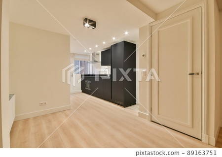 Modern black kitchen with metal details, minimalist interior with sunlight Full set of kitchen equipment Modern black kitchen with metal details, minimalist interior with sunlight Full set of kitchen equipment 89163751