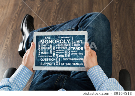 businessman with tablet on his lap 89164518