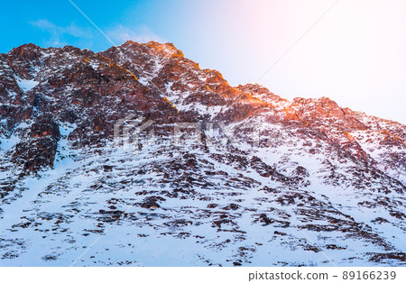 Snow mountain at sunrise Snow mountain at sunrise 89166239