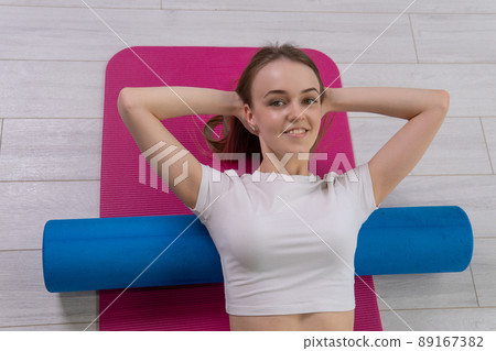 Roller the fitness mfr the on lies girl red mat mfr sportswear, from fit class for active from yoga body, stretching motivation. Gymnastics copy gym, smiling pose Roller the fitness mfr the on lies girl red mat mfr sportswear, from fit class for active from yoga body, stretching motivation. Gymnastics copy gym, smiling pose 89167382
