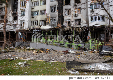 Irpin, Kyev region  Ukraine - 09.04.2022: Cities of Ukraine after the Russian occupation. Destroyed buildings on the streets of Irpen. Broken, shelled windows. Buildings after being hit by missiles. 89167415