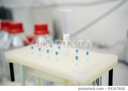 Vacuum Solid Phase extraction SPE manifold with catridge for sample preparation in chemical laboratory. 89167688