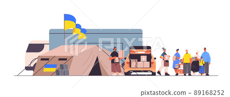 volunteers giving help boxes with Ukraininan flag to refugee humanitarian aid material assistance governmental help 89168252