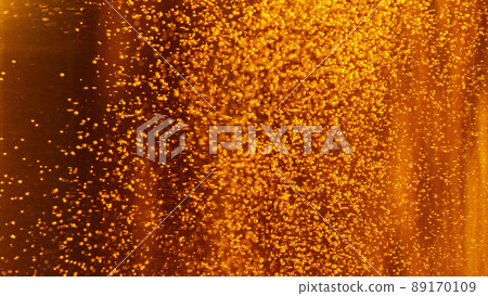 Macro photo of bubbling beer, closeup. 89170109